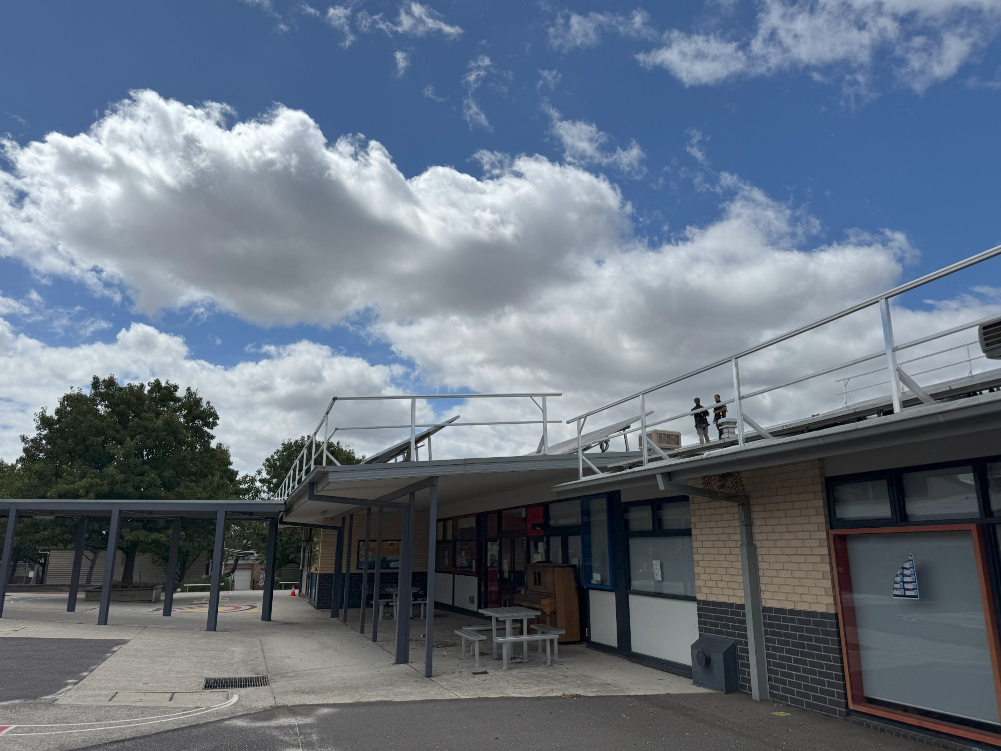 OBHSS team conducting height safety work on school rooftop